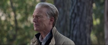 Movie still from “Avengers: Endgame” (2019), directed by Anthony Russo – An older man in a brown jacket looking to his left; Close Up shot, Over the shoulder angle