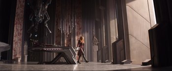 Movie still from “Avengers: Infinity War” (2018), directed by Anthony Russo – A woman sitting on a stage with a piano; Wide shot, High angle