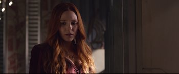 Movie still from “Avengers: Infinity War” (2018), directed by Anthony Russo – A woman with long red hair is looking at the camera; Close Up shot, Over the shoulder angle