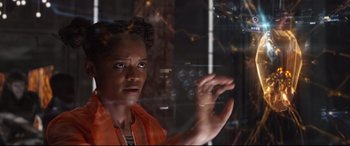 Movie still from “Avengers: Infinity War” (2018), directed by Anthony Russo – A woman standing in front of a glass window; Close Up shot, Low angle