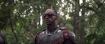 Movie still from “Avengers: Infinity War” (2018), directed by Anthony Russo – A man wearing a helmet and goggles in a forest; Close Up shot, Over the shoulder angle