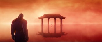 Movie still from “Avengers: Infinity War” (2018), directed by Anthony Russo – A person standing in the middle of a body of water; Extreme Wide shot, Low angle