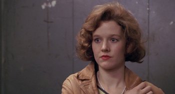 Movie still from “Awakenings” (1990), directed by Penny Marshall – A person wearing a leather jacket; Close Up shot, Over the shoulder angle