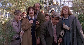 Movie still from “Awakenings” (1990), directed by Penny Marshall – A group of people standing next to each other; Medium shot, Low angle