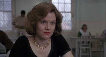 Movie still from “Awakenings” (1990), directed by Penny Marshall – A person wearing a necklace; Close Up shot, Over the shoulder angle