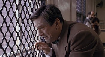 Movie still from “Awakenings” (1990), directed by Penny Marshall – A person leaning against a window; Close Up shot, Low angle