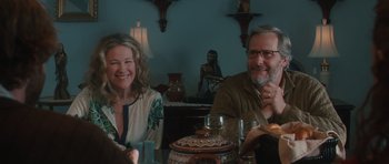 Movie still from “Away We Go” (2009), directed by Sam Mendes – A man and a woman sitting at a dinner table; Medium shot, Over the shoulder angle