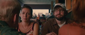 Movie still from “Away We Go” (2009), directed by Sam Mendes – A man and a woman sitting at a table in a restaurant; Close Up shot, Over the shoulder angle
