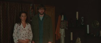 Movie still from “Away We Go” (2009), directed by Sam Mendes – A man and a woman standing next to each other in a room; Medium shot, Over the shoulder angle