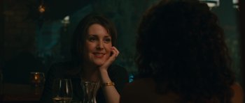 Movie still from “Away We Go” (2009), directed by Sam Mendes – A woman sitting in front of a mirror with her hand on her chin; Close Up shot, Over the shoulder angle