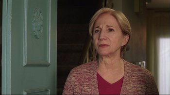 Movie still from “Away from Her” (2006), directed by Sarah Polley – An older woman with blonde hair wearing a red shirt; Close Up shot, Over the shoulder angle