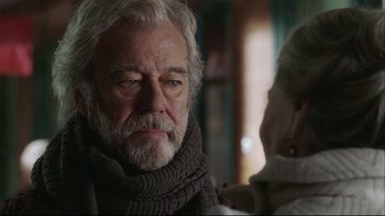 Movie still from “Away from Her” (2006), directed by Sarah Polley – An older man wearing a scarf looking at an older woman; Close Up shot, Over the shoulder angle