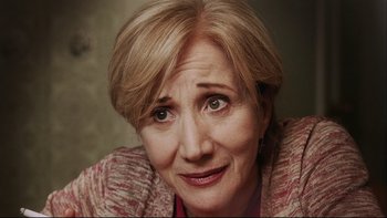 Movie still from “Away from Her” (2006), directed by Sarah Polley – An older woman with blonde hair and green eyes; Close Up shot, High angle