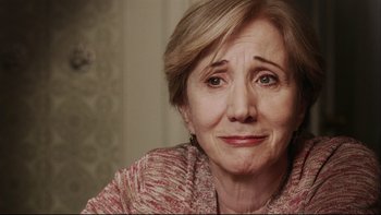 Movie still from “Away from Her” (2006), directed by Sarah Polley – An older woman is looking at the camera; Close Up shot, Over the shoulder angle