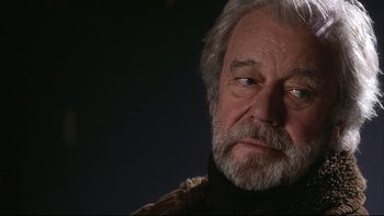 Movie still from “Away from Her” (2006), directed by Sarah Polley – An older man with a beard and a sweater; Close Up shot, Low angle
