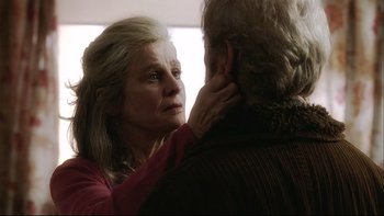 Movie still from “Away from Her” (2006), directed by Sarah Polley – An older woman touching the neck of an older man; Close Up shot, Over the shoulder angle
