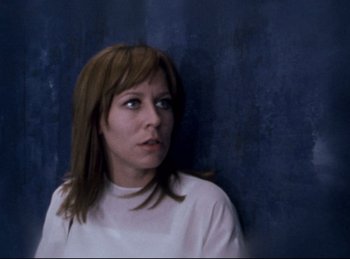 Movie still from “Baal” (1970), directed by Volker Schlöndorff – A person wearing a white t - shirt; Close Up shot, Low angle