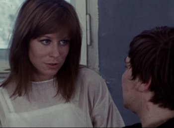 Movie still from “Baal” (1970), directed by Volker Schlöndorff – A woman in a white shirt is talking to a man; Close Up shot, Over the shoulder angle