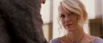Movie still from “Stay” (2005), directed by Marc Forster – A woman with blonde hair looking at the camera; Close Up shot, Over the shoulder angle