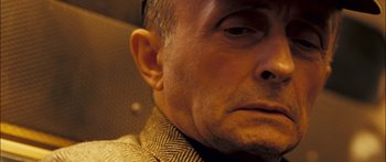 Movie still from “Stay” (2005), directed by Marc Forster – A man's face in a jacket; Extreme Close Up shot, High angle