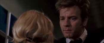 Movie still from “Stay” (2005), directed by Marc Forster – A person wearing a suit and tie; Close Up shot, Over the shoulder angle