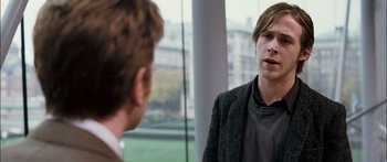 Movie still from “Stay” (2005), directed by Marc Forster – A man in a black jacket talking to another man in a black jacket; Close Up shot, Over the shoulder angle