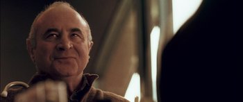 Movie still from “Stay” (2005), directed by Marc Forster – An older man sitting in front of a window; Close Up shot, Over the shoulder angle