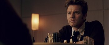 Movie still from “Stay” (2005), directed by Marc Forster – A man sitting in front of a chess board; Close Up shot, Over the shoulder angle