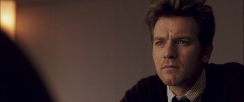 Movie still from “Stay” (2005), directed by Marc Forster – A person wearing a jacket; Close Up shot, Over the shoulder angle