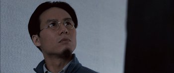 Movie still from “Stay” (2005), directed by Marc Forster – A man wearing glasses looking up at the sky; Close Up shot, Low angle