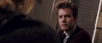 Movie still from “Stay” (2005), directed by Marc Forster – A person wearing a suit and tie; Close Up shot, Over the shoulder angle