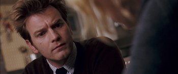 Movie still from “Stay” (2005), directed by Marc Forster – A person wearing a suit and tie; Close Up shot, Over the shoulder angle