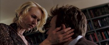 Movie still from “Stay” (2005), directed by Marc Forster – A man and a woman are touching their faces together; Close Up shot, Over the shoulder angle