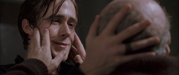 Movie still from “Stay” (2005), directed by Marc Forster – A man's face with his hand on his face; Close Up shot, Over the shoulder angle