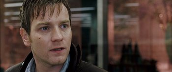Movie still from “Stay” (2005), directed by Marc Forster – A man's face in a brown jacket; Close Up shot, Over the shoulder angle