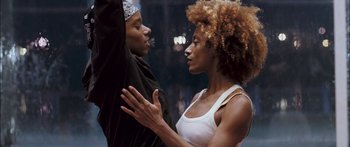 Movie still from “Stay” (2005), directed by Marc Forster – A man and a woman holding each other close; Close Up shot, Overhead angle