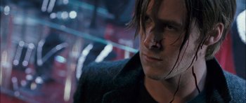 Movie still from “Stay” (2005), directed by Marc Forster – A person wearing a black jacket; Close Up shot, Over the shoulder angle