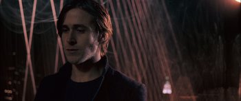 Movie still from “Stay” (2005), directed by Marc Forster – A person wearing a black jacket; Close Up shot, Low angle