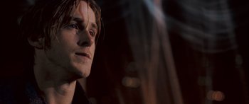 Movie still from “Stay” (2005), directed by Marc Forster – A man's face in the dark; Close Up shot, Low angle