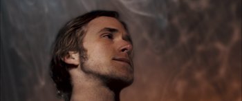 Movie still from “Stay” (2005), directed by Marc Forster – A man's face looking upward; Close Up shot, Low angle