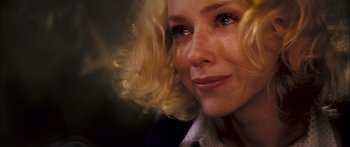 Movie still from “Stay” (2005), directed by Marc Forster – A woman with blonde hair and blue eyes; Close Up shot, Over the shoulder angle