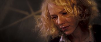 Movie still from “Stay” (2005), directed by Marc Forster – A person with long blonde hair; Close Up shot, Low angle