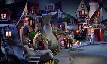 Movie still from “Babes in Toyland” (1961), directed by Jack Donohue – A scene of a town that has a lot of characters on it; Extreme Wide shot, High angle