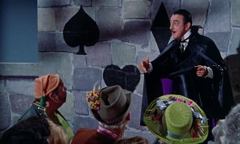 Movie still from “Babes in Toyland” (1961), directed by Jack Donohue – A man that is dressed as dracula; Medium shot, High angle