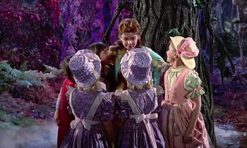 Movie still from “Babes in Toyland” (1961), directed by Jack Donohue – A group of children dressed up in costumes; Medium shot, Low angle