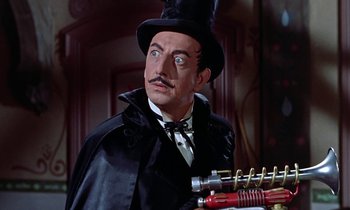 Movie still from “Babes in Toyland” (1961), directed by Jack Donohue – A person wearing a top hat; Close Up shot, Low angle