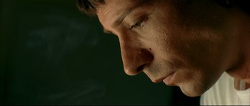 Movie still from “Bad Education” (2004), directed by Pedro Almodóvar – A man's face with his eyes closed; Extreme Close Up shot, Low angle
