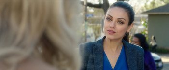 Movie still from “Bad Moms” (2016), directed by Scott Moore – A person wearing a jacket; Close Up shot, Over the shoulder angle