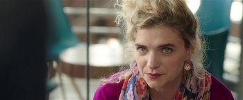 Movie still from “Bad Moms” (2016), directed by Scott Moore – A person wearing a scarf; Close Up shot, Over the shoulder angle