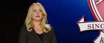 Movie still from “Bad Moms” (2016), directed by Scott Moore – A woman with blonde hair and a black jacket; Close Up shot, Low angle